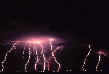 1. Multiple cloud-to-ground lightning strokes during a night-time thunderstorm, March, 1978. Norman, State of Oklahoma, USA. Photo Credit: C. Clark, OAR/ERL/National Severe Storms Laboratory (NSSL), National Oceanic and Atmospheric Administration Photo Library (http://www.photolib.noaa.gov), National Severe Storms Laboratory (NSSL) Collection, National Oceanic and Atmospheric Administration (NOAA, http://www.noaa.gov), United States Department of Commerce (http://www.commerce.gov), Government of the United States of America (USA).