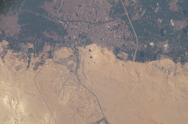 6. The Great Pyramids and El Giza, April 2, 2005, Jumhuriyat Misr al-Arabiyah - Arab Republic of Egypt, As Seen From the International Space Station (Expedition 10). Photo Credit: NASA; ISS010-E-22442, The Great Pyramids, El Giza, International Space Station (Expedition Ten); Image Science and Analysis Laboratory, NASA-Johnson Space Center. 'Astronaut Photography of Earth - Display Record.' <http://eol.jsc.nasa.gov/scripts/sseop/photo.pl?mission=ISS010&roll=E&frame=22442>; National Aeronautics and Space Administration (NASA, http://www.nasa.gov), Government of the United States of America (USA).