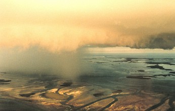 1. A Huge Thunderstorm Cloud is Partitioned: To the Left, A Rain Shaft -- To the Right, A Rainfree Base, August 1993. Key West, State of Florida, USA. Photo Credit: Lieutenant Debora Barr, NOAA Corps, National Oceanic and Atmospheric Administration Photo Library (http://www.photolib.noaa.gov), Historic NWS (National Weather Service) Collection, National Oceanic and Atmospheric Administration (NOAA, http://www.noaa.gov), United States Department of Commerce (http://www.commerce.gov), Government of the United States of America (USA).