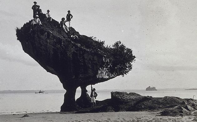 Having Fun Climbing a Mushroom Coral Rock, 1926, Republika ng Pilipinas - Republic of the Philippines. Photo Credit: Family of Captain William M. Scaife, C&GS, National Oceanic and Atmospheric Administration Photo Library (http://www.photolib.noaa.gov, theb3378), Historic C&GS Collection, National Oceanic and Atmospheric Administration (NOAA, http://www.noaa.gov), United States Department of Commerce (http://www.commerce.gov), Government of the United States of America (USA).