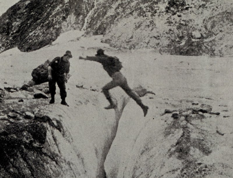 A Frightening Jump Over the Glacier's Crevasse, 1916. Bradford Glacier, State of Alaska, USA. Photo Credit: NOAA Central Library, National Oceanic and Atmospheric Administration Photo Library (http://www.photolib.noaa.gov, theb0721), Historic C&GS Collection, National Oceanic and Atmospheric Administration (NOAA, http://www.noaa.gov), United States Department of Commerce (http://www.commerce.gov), Government of the United States of America (USA).