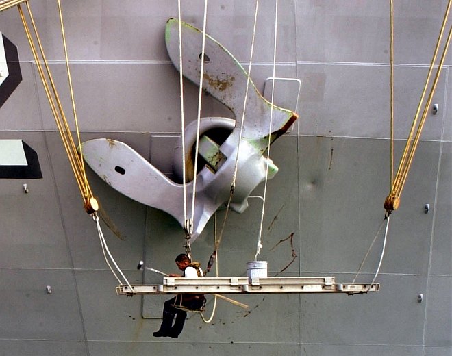 While at Sea and Suspended in the Air, Painting and Preservation of the Ship's Massive 30,000-pound Anchor, July 4, 2000. Photo Credit: Photographer's Mate 1st Class Spike Call, Navy NewsStand - Eye on the Fleet Photo Gallery (http://www.news.navy.mil/view_photos.asp, 000704-N-5961C-005), United States Navy (USN, http://www.navy.mil), United States Department of Defense (DoD, http://www.DefenseLink.mil or http://www.dod.gov), Government of the United States of America (USA).