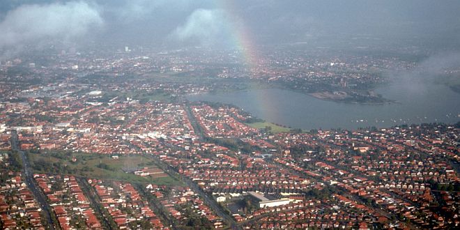 Aerial View of a Rainbow and the City of Sydney, Commonwealth of Australia. Photo Credit: Gary M. Stolz, Washington DC Library, United States Fish and Wildlife Service Digital Library System (http://images.fws.gov, WO8426-002), United States Fish and Wildlife Service (FWS, http://www.fws.gov), United States Department of the Interior (http://www.doi.gov), Government of the United States of America (USA).