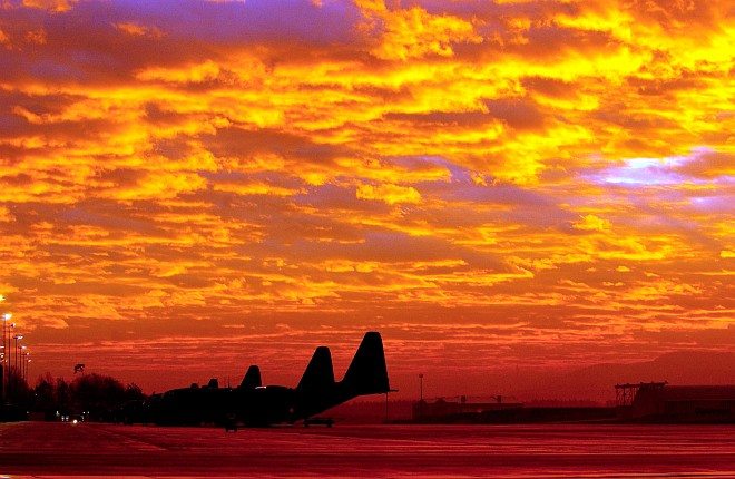 Stunningly Beautiful Sunrise over Ramstein Air Base. Landes Rheinland-Pfalz (State of Rhineland-Palatinate), Bundesrepublik Deutschland - Federal Republic of German. Photo Credit: Tech. Sgt. Justin D. Pyle, Air Force Link - Week in Photos, December 5, 2003 (http://www.af.mil/weekinphotos/031205-01.html, 031201-F-6701P-001, "Fire in the sky"), United States Air Force (USAF, http://www.af.mil), United States Department of Defense (DoD, http://www.DefenseLink.mil or http://www.dod.gov), Government of the United States of America (USA).