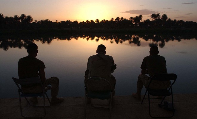 Sunset on the Banks of the Euphrates River, May 28, 2003. Al Hillah, Al Jumhuriyah al Iraqiyah - Republic of Iraq. Photo Credit: Photographer's Mate 1st Class Arlo K. Abrahamson, Navy NewsStand - Eye on the Fleet Photo Gallery (http://www.news.navy.mil/view_photos.asp, 030528-N-5362A-009), United States Navy (USN, http://www.navy.mil), United States Department of Defense (DoD, http://www.DefenseLink.mil or http://www.dod.gov), Government of the United States of America (USA).