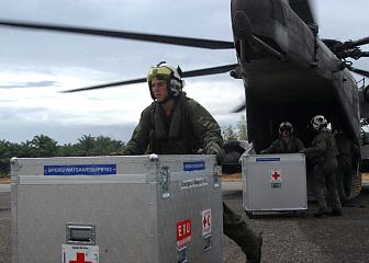 4. Unloading Medical Supplies From a CH-53E Super Stallion Helicopter at Muebaloh City Air Field, January 8, 2005. Meubaloh, Sumatra, Republik Indonesia. Photo Credit: Journalist 3rd Class Ryan Valverde, Navy NewsStand - Eye on the Fleet Photo Gallery (http://www.news.navy.mil/view_photos.asp, 050108-N-4451V-007), United States Navy (USN, http://www.navy.mil), United States Department of Defense (DoD, http://www.DefenseLink.mil or http://www.dod.gov), Government of the United States of America (USA).