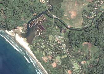 1. Alive and Thriving: The Village of Gleebruk Before the Tsunami Stuck. DigitalGlobe Satellite Photo, April 12, 2004. Republik Indonesia. Photo Credit: DigitalGlobe (http://DigitalGlobe.com), Tsunami Media Gallery, QuickBird Images of Tsunami Sites (http://DigitalGlobe.com/tsunami_gallery.html), Indonesia, April 12, 2004, "Gleebruk Village (Before Tsunami)" "Village detail before tsunami". DigitalGlobe Imagery Analysis: "Tsunami Aftermath: Near Banda Aceh, Indonesia; QuickBird Satellite Imagery, January 2, 2005" <http://DigitalGlobe.com/images/tsunami/Gleebruk_Tsunami_Damage_Jan2.pdf>.