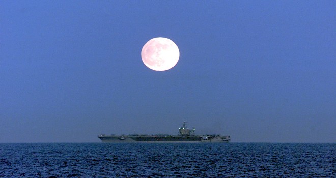 The Full Moon of November 20, 2002 Illuminates the Nuclear Aircraft Carrier USS Carl Vinson. Off the Southern Coast of the State of California, USA. Photo Credit: Electronics Warfare Technician 2nd Class Christopher Ware, Navy NewsStand - Eye on the Fleet Photo Gallery (http://www.news.navy.mil/view_photos.asp, 021120-N-9297W-001), United States Navy (USN, http://www.navy.mil), United States Department of Defense (DoD, http://www.DefenseLink.mil or http://www.dod.gov), Government of the United States of America (USA).