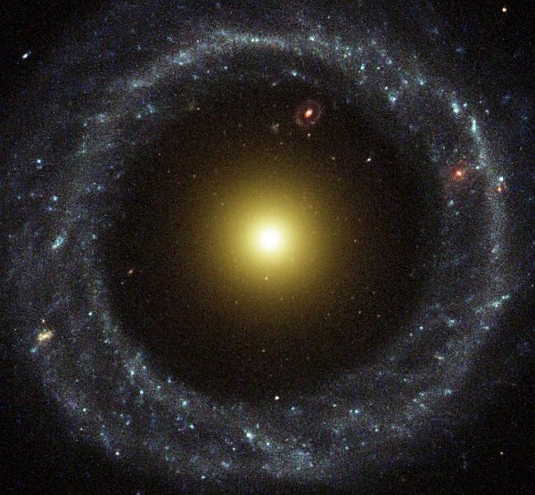 Hoag's Object, a Ring Galaxy Residing in the Constellation Serpens. Photo Credit: A Wheel within a Wheel, July 9, 2001, STScI-2002-21, NASA's Earth-orbiting Hubble Space Telescope (http://HubbleSite.org); The Hubble Heritage Team (STScI/AURA), National Aeronautics and Space Administration (NASA, http://www.nasa.gov), Government of the United States of America (USA). Acknowledgment: Ray A. Lucas (STScI/AURA).