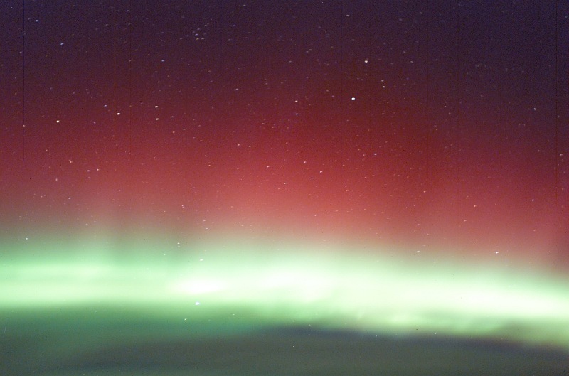 3. Red Aurora Borealis and Green Aurora Borealis (Northern Lights), March 30, 2003 As Seen From the International Space Station (Expedition 6). Photo Credit: NASA; ISS006-E-41615, Red and Green Aurora Borealis, Stars, International Space Station (Expedition Six); Image Science and Analysis Laboratory, NASA-Johnson Space Center. 'Astronaut Photography of Earth - Display Record.' <http://eol.jsc.nasa.gov/scripts/sseop/photo.pl?mission=ISS006&roll=E&frame=41615>; National Aeronautics and Space Administration (NASA, http://www.nasa.gov), Government of the United States of America (USA).