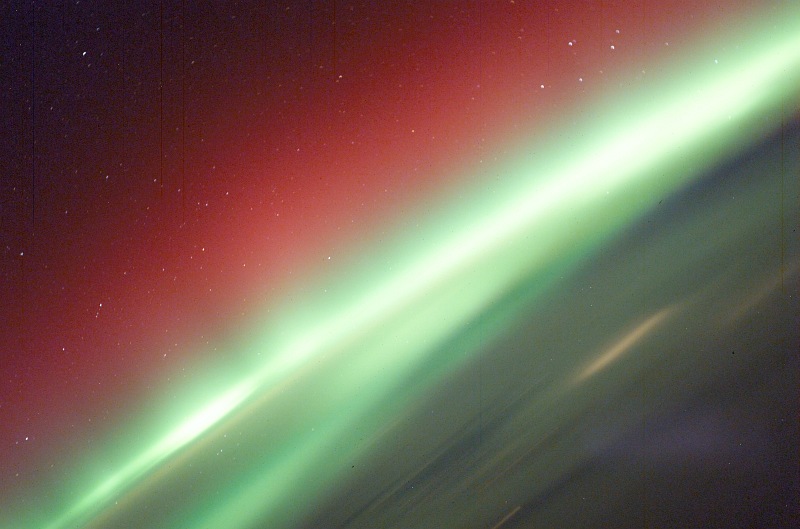 5. Red and Green Aurora Borealis (Northern Lights), March 30, 2003 As Seen From the International Space Station (Expedition 6). Photo Credit: NASA; ISS006-E-41627, Red and Green Aurora Borealis, Stars, International Space Station (Expedition Six); Image Science and Analysis Laboratory, NASA-Johnson Space Center. 'Astronaut Photography of Earth - Display Record.' <http://eol.jsc.nasa.gov/scripts/sseop/photo.pl?mission=ISS006&roll=E&frame=41627>; National Aeronautics and Space Administration (NASA, http://www.nasa.gov), Government of the United States of America (USA).