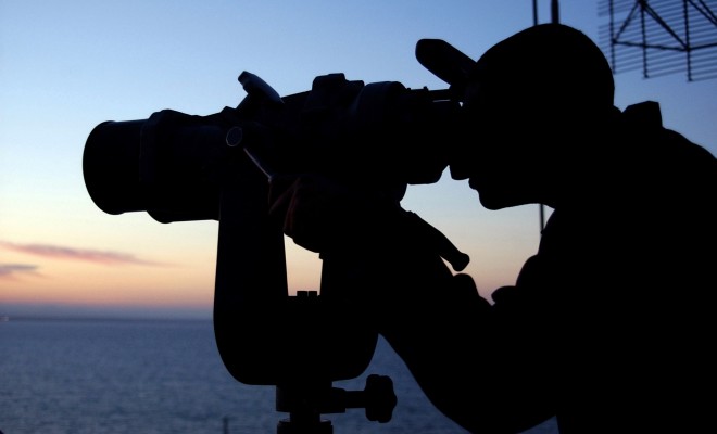 Watching With High-Powered Binoculars Aboard the United States Navy Aircraft Carrier USS Harry S. Truman (CVN 75), March 26, 2005. Suez Canal, Jumhuriyat Misr al-Arabiyah - Arab Republic of Egypt. Photo Credit: Photographer's Mate 3rd Class Nichole E. Wozny, Navy NewsStand - Eye on the Fleet Photo Gallery (http://www.news.navy.mil/view_photos.asp, 050326-N-3665W-018), United States Navy (USN, http://www.navy.mil), United States Department of Defense (DoD, http://www.DefenseLink.mil or http://www.dod.gov), Government of the United States of America (USA).