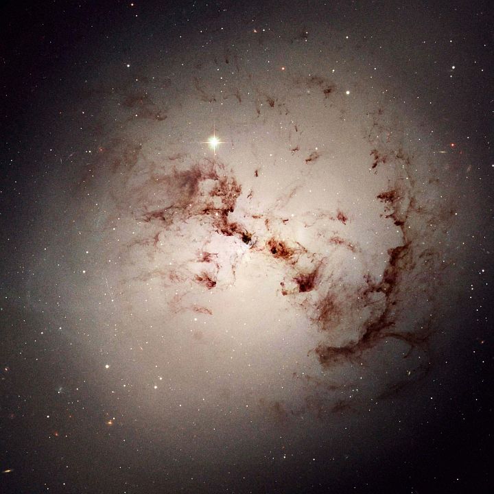 Giant Elliptical Galaxy NGC 1316 or Fornax A is 75 Million Light-Years (23 Megaparsecs) Away in the Fornax Constellation. Photo Credit: Hubble Spies Cosmic Dust Bunnies, March 2003 (Release date: March 31, 2005), STScI-2005-11, NASA's Earth-orbiting Hubble Space Telescope (http://HubbleSite.org); European Space Agency (ESA, http://SpaceTelescope.org), The Hubble Heritage Team (STScI/AURA), National Aeronautics and Space Administration (NASA, http://www.nasa.gov), Government of the United States of America (USA). Acknowledgment: Dr. Paul Goudfrooij (STScI).