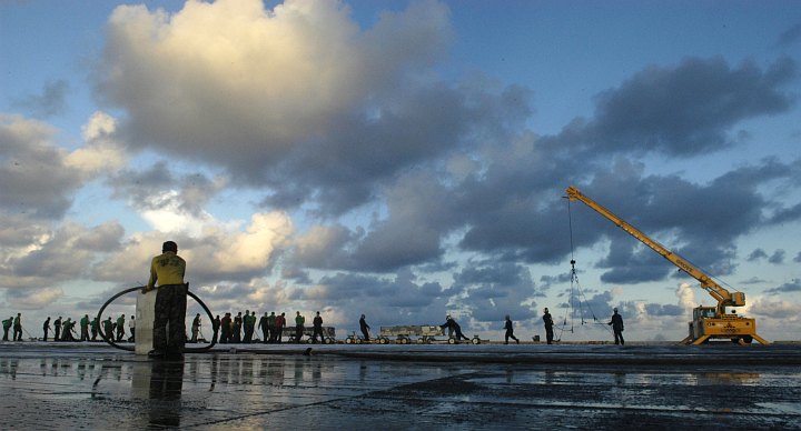 Clouds, Clouds, and More Clouds Float Above the United States Navy Aircraft Carrier USS Kitty Hawk (CV 63) and Over the Pacific Ocean, August 18, 2005. Photo Credit: Photographer's Mate Airman Jimmy C. Pan, Navy NewsStand - Eye on the Fleet Photo Gallery (http://www.news.navy.mil/view_photos.asp, 050818-N-3136P-095), United States Navy (USN, http://www.navy.mil), United States Department of Defense (DoD, http://www.DefenseLink.mil or http://www.dod.gov), Government of the United States of America (USA).