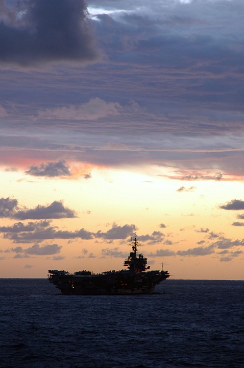 This is a Very Beautiful Sunset in the Coral Sea, June 23, 2005. Photo Credit: Photographer's Mate 3rd Class Bo J. Flannigan, Navy NewsStand - Eye on the Fleet Photo Gallery (http://www.news.navy.mil/view_photos.asp, 050623-N-5781F-713), United States Navy (USN, http://www.navy.mil); United States Department of Defense (DoD, http://www.DefenseLink.mil or http://www.dod.gov), Government of the United States of America (USA).