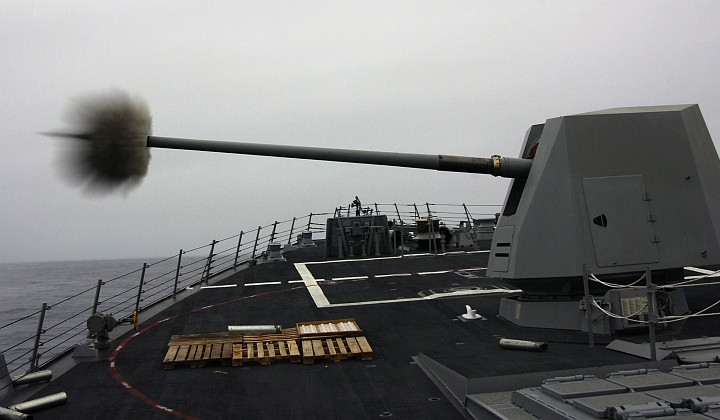 Firing the MK 45 5-inch/62 Caliber Lightweight Gun Aboard the Guided Missile Destroyer USS Preble (DDG 88), United States Navy, Pacific Ocean. Photo Credit: Photographer's Mate 1st Class Richard J. Brunson, Navy NewsStand - Eye on the Fleet Photo Gallery (http://www.news.navy.mil/view_photos.asp, 050819-N-6932B-072), United States Navy (USN, http://www.navy.mil), United States Department of Defense (DoD, http://www.DefenseLink.mil or http://www.dod.gov), Government of the United States of America (USA).