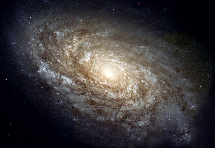 Spiral Galaxy NGC 4414 -- Enormous and Magnificent. Photo Credit: Magnificent Details in a Dusty Spiral Galaxy, April/June 1995 and April 1999 (Release date: June 3, 1999), STScI-1999-25, NASA's Earth-orbiting Hubble Space Telescope (http://HubbleSite.org); Hubble Heritage Team (AURA/STScI), National Aeronautics and Space Administration (NASA, http://www.nasa.gov), Government of the United States of America (USA).