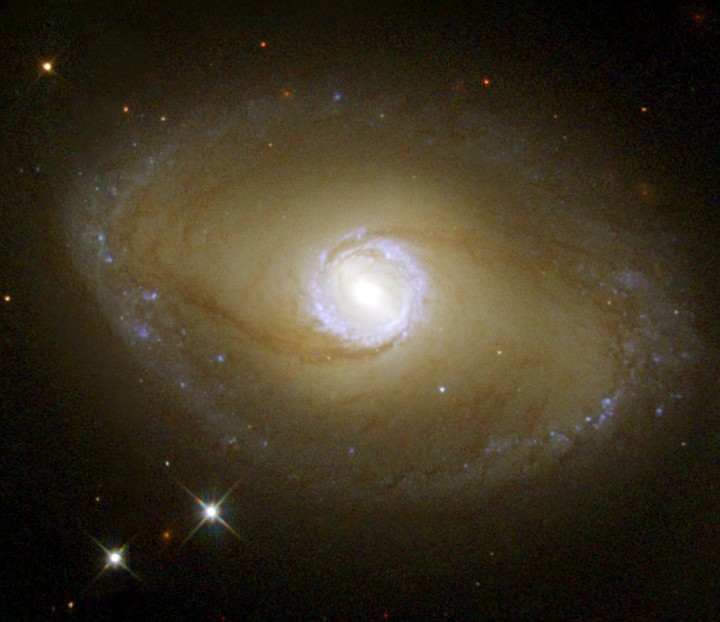 Ultraviolet View of Barred-Spiral Galaxy NGC 6782 in the Constellation Pavo. Photo Credit (Full size): Hubble Reveals Ultraviolet Galactic Ring, June 2000 and June 2001 (Release date: November 1, 2001), STScI-2001-37, NASA's Earth-orbiting Hubble Space Telescope (http://HubbleSite.org); The Hubble Heritage Team (STScI/AURA), National Aeronautics and Space Administration (NASA, http://www.nasa.gov), Government of the United States of America (USA). Acknowledgment: Dr. Rogier Windhorst of Arizona State University, State of Arizona, USA.