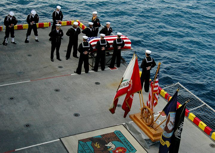 The Burial At Sea ceremony on January 22, 2004 aboard the U.S. Navy USS Tarawa (LHA 1), San Diego, State of California, USA. Photo Credit: Photographer's Mate Airman Matthew Clayborne, Navy NewsStand - Eye on the Fleet Photo Gallery (http://www.news.navy.mil/view_photos.asp, 050122-N-5517C-053), United States Navy (USN, http://www.navy.mil); United States Department of Defense (DoD, http://www.DefenseLink.mil or http://www.dod.gov), Government of the United States of America (USA).