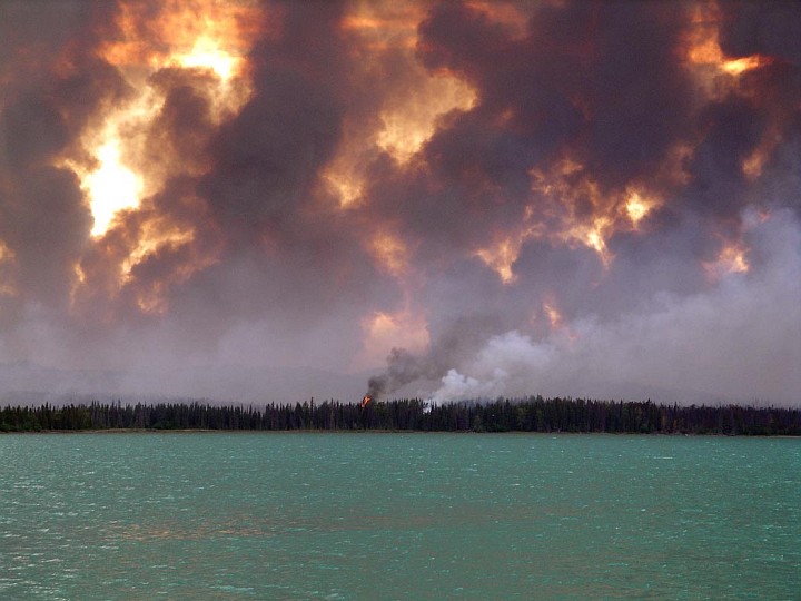 Fire and Smoke From the King County Creek Fire 2005 as Seen From Skilak Lake in Kenai National Wildlife Refuge, State of Alaska, USA. Photo Credit: U.S. Fish and Wildlife Service, Alaska Image Library, United States Fish and Wildlife Service Digital Library System (http://images.fws.gov, DI-Fire Pictures 2005 050), United States Fish and Wildlife Service (FWS, http://www.fws.gov), United States Department of the Interior (http://www.doi.gov), Government of the United States of America (USA).