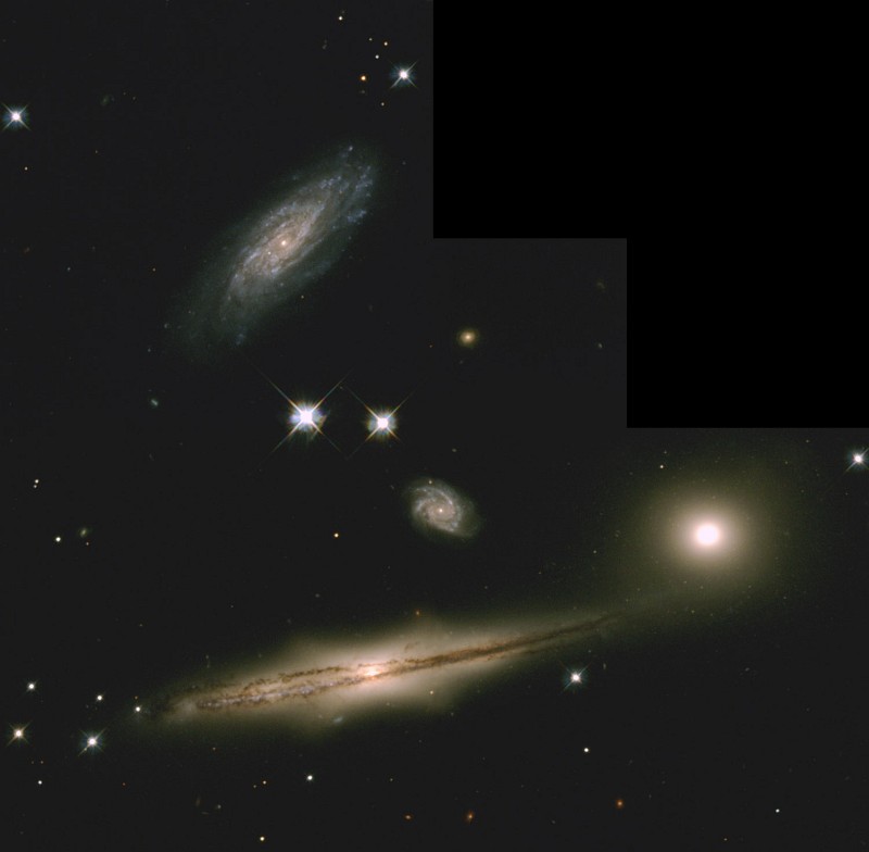 The Four Galaxies of the Hickson Compact Group 87 (HCG 87), a Cluster of Interacting Galaxies, Constellation Capricornus (Capricorn). Photo Credit: Hickson Compact Group 87: A Minuet of Four Galaxies, July 19-25, 1999 (Release date: September 2, 1999), STScI-1999-31, NASA's Earth-orbiting Hubble Space Telescope (http://HubbleSite.org); The Hubble Heritage Team (STScI/AURA), National Aeronautics and Space Administration (NASA, http://www.nasa.gov), Government of the United States of America (USA).