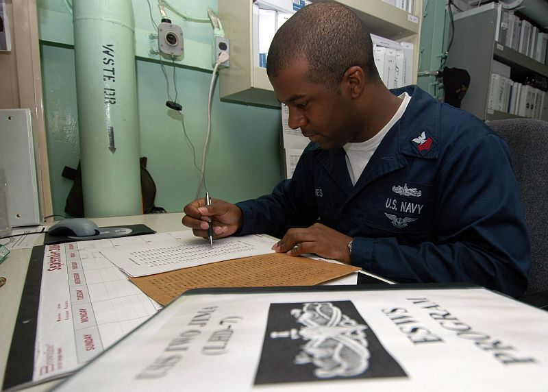 Grading a Sailor's Test Aboard the United States Navy Amphibious Assault Ship USS Iwo Jima (LHD 7), September 2, 2006 in the Arabian Sea. Photo Credit: Mass Communication Specialist Seaman Joshua T. Rodriguez, Navy NewsStand - Eye on the Fleet Photo Gallery (http://www.news.navy.mil/view_photos.asp, 060902-N-6403R-005), United States Navy (USN, http://www.navy.mil), United States Department of Defense (DoD, http://www.DefenseLink.mil or http://www.dod.gov), Government of the United States of America (USA).