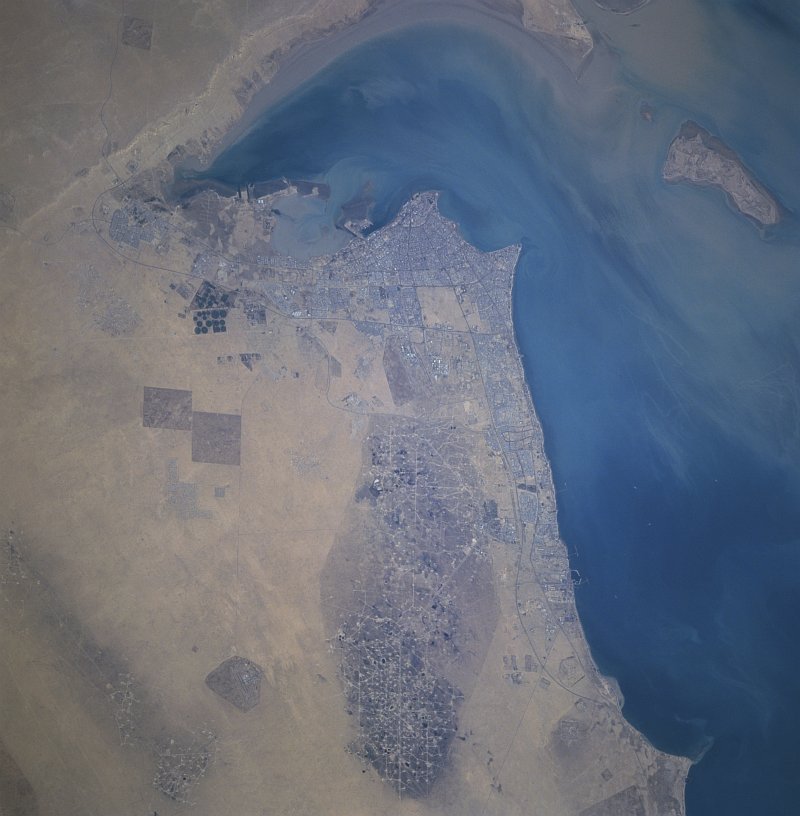 View From Outer Space of a Small Portion of Earth, Our Home Planet, November 1996: Dawlat al Kuwayt - State of Kuwait. Photo Credit: Persian Gulf, Kuwait City, Al Burqan Oil Field, and Kuwait's plain and desert; NASA's Space Shuttle Columbia: STS-80 Mission; NASA-Johnson Space Center. 'Astronaut Photography of Earth - Display Record.' <http://earth.jsc.nasa.gov/sseop/efs/images.pl?photo=STS080-733-21>; National Aeronautics and Space Administration (NASA, http://www.nasa.gov), Government of the United States of America (USA). The photo's full size request URL is <http://earth.jsc.nasa.gov/scripts/sseop/LargeImageAccess.pl?directory=EFS/highres/STS080&filename=STS080-733-21.JPG&filesize=11112114>