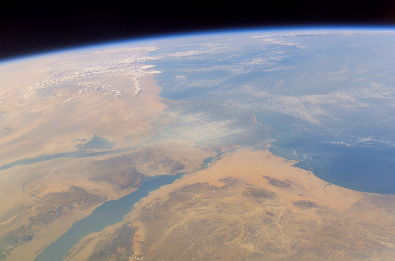 17. Clouds Over North Africa and the Mediterranean Sea and a Scenic View of the Nile River, the Nile River Delta, Gulf of Suez and Part of the Sinai Peninsula in Jumhuriyat Misr al-Arabiyah - Arab Republic of Egypt on October 11, 2007 at 12:42:24.672 GMT As Seen From the International Space Station (Expedition 15); Latitude (LAT): 29.0, Longitude (LON): 39.4, Altitude (ALT): 182 Nautical Miles, Sun Azimuth (AZI): 244 degrees, Sun Elevation Angle (ELEV): 27 degrees. Photo Credit: NASA; ISS015-E-34872, Earth's limb, Clouds, North Africa, Mediterranean Sea, Nile River, Nile River Delta, Gulf of Suez, Sinai Peninsula, International Space Station (Expedition Fifteen); Image Science and Analysis Laboratory, NASA-Johnson Space Center. 'Astronaut Photography of Earth - Display Record.' <http://eol.jsc.nasa.gov/scripts/sseop/photo.pl?mission=ISS015&roll=E&frame=34872>; National Aeronautics and Space Administration (NASA, http://www.nasa.gov), Government of the United States of America (USA).