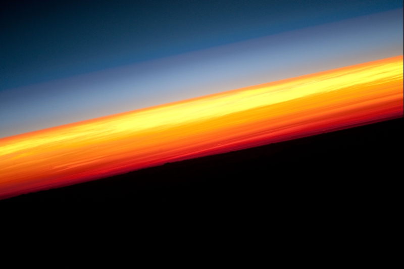40. Earth's Colorful Horizon, January 3, 2010 at 12:27:52 GMT, As Seen From the International Space Station (Expedition Twenty-Two) While Orbiting Above the North Pacific Ocean, Latitude (LAT): 4.9, Longitude (LON): -117.0, Altitude (ALT): 180 Nautical Miles, Sun Azimuth (AZI): 113 degrees, Sun Elevation Angle (ELEV): -21 degrees. Photo Credit: NASA, International Space Station (Expedition 22), ISS022-E-16109; Image Science and Analysis Laboratory, NASA-Johnson Space Center. 'Astronaut Photography of Earth - Display Record.' <http://eol.jsc.nasa.gov/scripts/sseop/photo.pl?mission=ISS022&roll=E&frame=16109>; National Aeronautics and Space Administration (NASA, http://www.nasa.gov), Government of the United States of America (USA).