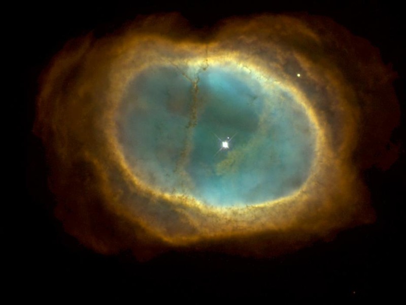 Planetary Nebula NGC 3132, Also Known As the 'Eight-Burst' Nebula or the 'Southern Ring' Nebula, Vela Constellation. Photo Credit: A Glowing Pool of Light: Planetary Nebula NGC 3132, (Release date: November 5, 1998), STScI-1998-39, NASA's Earth-orbiting Hubble Space Telescope (http://HubbleSite.org); The Hubble Heritage Team (STScI/AURA), National Aeronautics and Space Administration (NASA, http://www.nasa.gov), Government of the United States of America (USA).