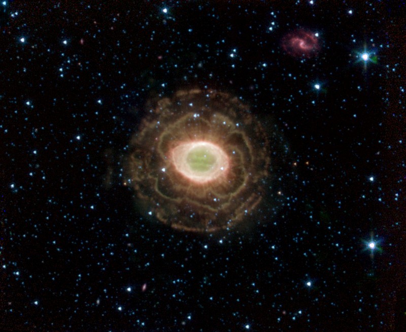 Ring Nebula -- Messier Object 57 or NGC 6720 in the Constellation Lyra. Photo Credit: Spitzer Space Telescope (SST, http://www.spitzer.caltech.edu/spitzer/); Planetary Photojournal (http://photojournal.jpl.nasa.gov, PIA07343:), Harvard-Smithsonian CfA and National Aeronautics and Space Administration (NASA, http://www.nasa.gov)/Jet Propulsion Laboratory-Caltech (JPL, http://www.jpl.nasa.gov), Government of the United States of America.