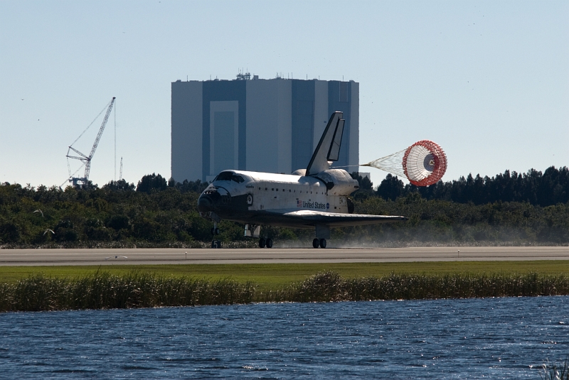 15. With the Main Landing Gear Down and Drag Parachute Deployed and Unfurled, Space Shuttle Atlantis (STS-129) Makes A Picture Perfect Landing On Runway 33, November 27, 2009, NASA John F. Kennedy Space Center, State of Florida, USA. Photo Credit: Tim Terry, NASA; STS-129 Mission, Return of Space Shuttle Atlantis, November 27, 2009, Kennedy Media Gallery (http://mediaarchive.ksc.nasa.gov) Photo Number: KSC-2009-6601 (http://mediaarchive.ksc.nasa.gov/detail.cfm?mediaid=44508), John F. Kennedy Space Center (KSC, http://www.nasa.gov/centers/kennedy), National Aeronautics and Space Administration (NASA, http://www.nasa.gov), Government of the United States of America.