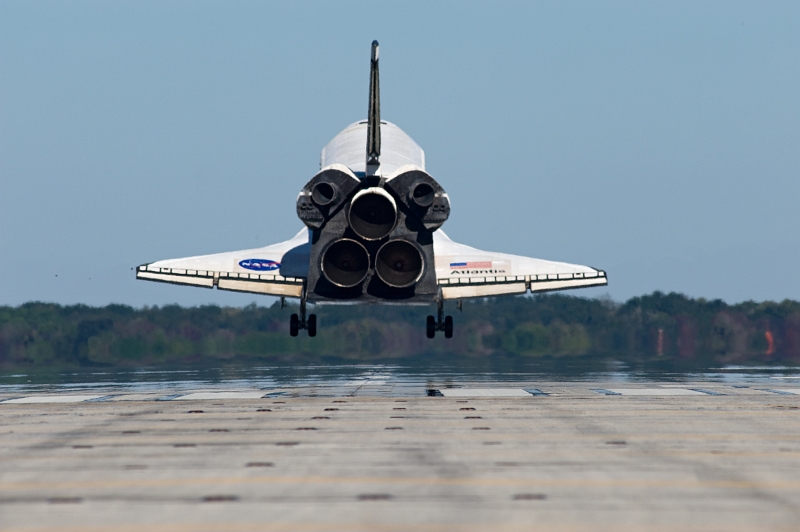 14. Space Shuttle Atlantis (STS-129) Seconds Away From A Mid-Morning Landing On Runway 33, November 27, 2009, NASA John F. Kennedy Space Center, State of Florida, USA. Photo Credit: NASA/Kevin O'Connell and Rick Prickett; STS-129 Mission, Return of Space Shuttle Atlantis, November 27, 2009, Kennedy Media Gallery (http://mediaarchive.ksc.nasa.gov) Photo Number: KSC-2009-6610 (http://mediaarchive.ksc.nasa.gov/detail.cfm?mediaid=44517), John F. Kennedy Space Center (KSC, http://www.nasa.gov/centers/kennedy), National Aeronautics and Space Administration (NASA, http://www.nasa.gov), Government of the United States of America.