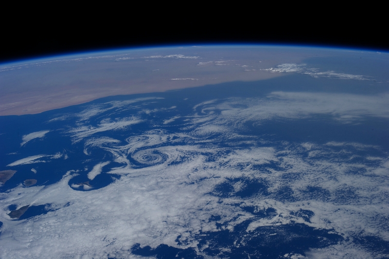 1. Clouds and Vortices Over the Atlantic Ocean As Seen From the International Space Station (Expedition 36) on July 6, 2013 at 17:28:04 GMT, Latitude (LAT): 30.6, Longitude (LON): -23.2, Altitude (ALT): 219 Nautical Miles, Sun Azimuth (AZI): 276 degrees, Sun Elevation Angle (ELEV): 38 degrees. Photo Credit: NASA; ISS036-E-16252, International Space Station (Expedition 36); Image Science and Analysis Laboratory, NASA-Johnson Space Center. 'The Gateway to Astronaut Photography of Earth.' <http://eol.jsc.nasa.gov/scripts/sseop/photo.pl?mission=ISS036&roll=E&frame=16252>; National Aeronautics and Space Administration (NASA, http://www.nasa.gov), Government of the United States of America (USA).