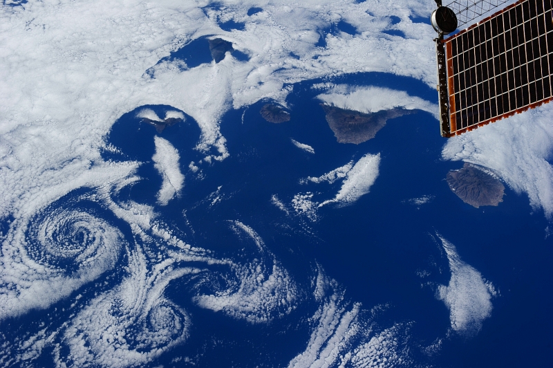 6. Clouds and Vortices Over the Atlantic Ocean As Seen From the International Space Station (Expedition 36) on July 6, 2013 at 17:30:38 GMT, Latitude (LAT): 23.5, Longitude (LON): -16.0, Altitude (ALT): 220 Nautical Miles, Sun Azimuth (AZI): 283 degrees, Sun Elevation Angle (ELEV): 30 degrees. Photo Credit: NASA; ISS036-E-16273, International Space Station (Expedition 36); Image Science and Analysis Laboratory, NASA-Johnson Space Center. 'The Gateway to Astronaut Photography of Earth.' <http://eol.jsc.nasa.gov/scripts/sseop/photo.pl?mission=ISS036&roll=E&frame=16273>; National Aeronautics and Space Administration (NASA, http://www.nasa.gov), Government of the United States of America (USA).