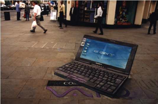 [un computer Sony "sbuca" dalla pavimentazione]