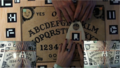 "Video_experiment_with_ouija_board.png" by User:Ixocactus
