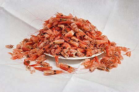 A heap of shrimp shells on a plate