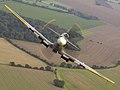 65 Air to air image of a Spitfire, taken over RAF Coningsby. MOD 45147974 uploaded by Fæ, nominated by Christian Ferrer