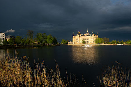 Schwerin Castle shortly after a storm in the evening sun