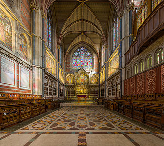 The choir and sanctuary of Keble College Chapel, facing east in Oxford, England.
