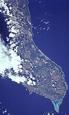 9. Guahan (United States Territory of Guam). Earth Sciences and Image Analysis, NASA-Johnson Space Center. 8 December 2003. "Astronaut Photography of Earth - Quick View." <http://eol.jsc.nasa.gov/scripts/sseop/QuickView.pl?directory=ESC&ID=STS068-258-55>; National Aeronautics and Space Administration (NASA, http://www.nasa.gov), Government of the United States of America (USA).