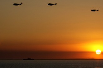 2. Sunset at the Northern Arabian Gulf. Photo Credit: Petty Officer Tom Sperduto of the United States Coast Guard (http://www.uscg.mil), Navy NewsStand - Eye on the Fleet Photo Gallery (http://www.news.navy.mil/view_photos.asp, 030302-C-9409S-009), United States Navy (USN, http://www.navy.mil), United States Department of Defense (DoD, http://www.DefenseLink.mil or http://www.dod.gov), Government of the United States of America (USA).