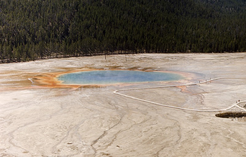 5. Picture From 1966 of the Grand Prismatic Spring, Midway Geyser Basin, Yellowstone National Park, State of Wyoming, USA. Photo Credit: NPS Photo, RG Johnsson, 1966. Yellowstone Digital Slide File - Midway & Lower Geyser Basin (http://www.nps.gov/archive/yell/slidefile/index.htm and http://www.nps.gov/archive/yell/slidefile/thermalfeatures/hotspringsterraces/midwaylower/Page.htm, Image 06121), Yellowstone National Park (http://www.nps.gov/yell), National Park Service (NPS, http://www.nps.gov), United States Department of the Interior (http://www.doi.gov), Government of the United States of America (USA).