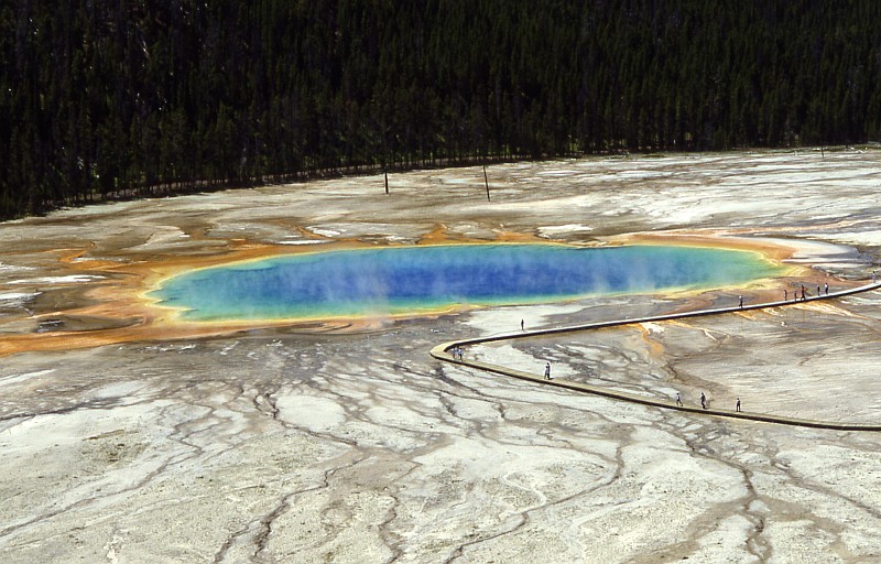6. Picture From 1987 of the Grand Prismatic Spring, Midway Geyser Basin, Yellowstone National Park, State of Wyoming, USA. Photo Credit: NPS Photo, Ed Austin and Herb Jones, 1987. Yellowstone Digital Slide File - Midway & Lower Geyser Basin (http://www.nps.gov/archive/yell/slidefile/index.htm and http://www.nps.gov/archive/yell/slidefile/thermalfeatures/hotspringsterraces/midwaylower/Page.htm, Image 13401), Yellowstone National Park (http://www.nps.gov/yell), National Park Service (NPS, http://www.nps.gov), United States Department of the Interior (http://www.doi.gov), Government of the United States of America (USA).