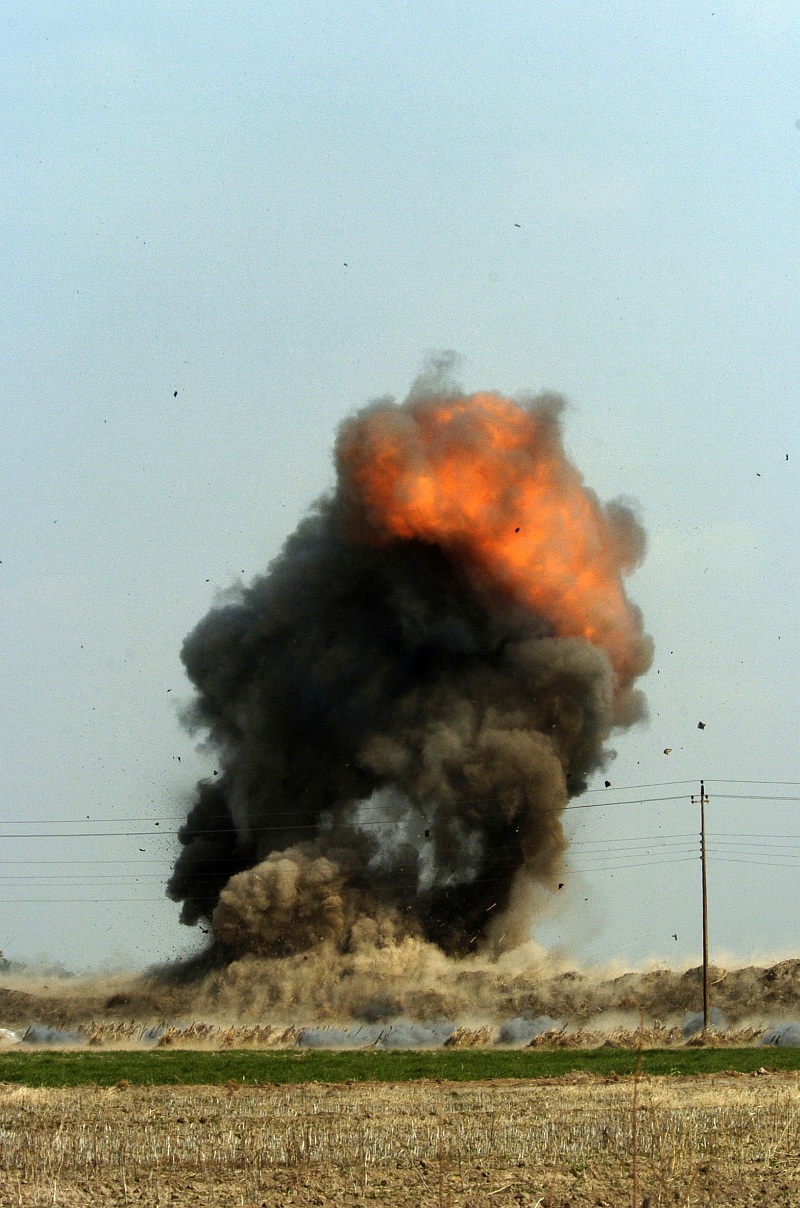 1. Explosive and Destructive Power: Fire In the Cloud. Controlled Detonation of Unexploded Ordnance, February 10, 2005, Baghdad, Al Jumhuriyah al Iraqiyah - Republic of Iraq. Photo Credit: Photographer's Mate 1st Class Richard J. Brunson, Navy NewsStand - Eye on the Fleet Photo Gallery (http://www.news.navy.mil/view_photos.asp, 050210-N-6932B-214), United States Navy (USN, http://www.navy.mil), United States Department of Defense (DoD, http://www.DefenseLink.mil or http://www.dod.gov), Government of the United States of America (USA).