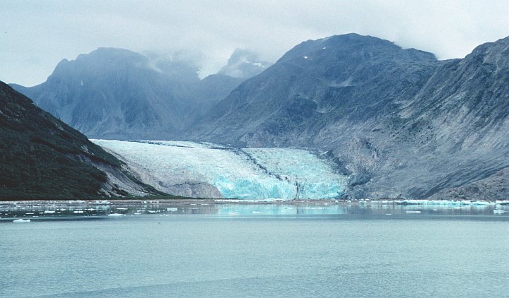 Riggs Glacier at the East End of Muir Inlet, State of Alaska, USA. Photo Credit: Commander John Bortniak, NOAA Corps; National Oceanic and Atmospheric Administration Photo Library (http://www.photolib.noaa.gov, corp1943), America's Coastlines Collection, NOAA Central Library, National Oceanic and Atmospheric Administration (NOAA, http://www.noaa.gov), United States Department of Commerce (http://www.commerce.gov), Government of the United States of America (USA).