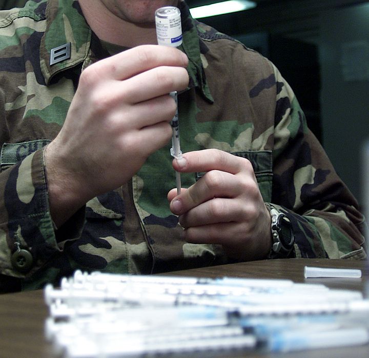 Preparing Syringes With Anthrax Vaccine Aboard USS Saipan (LHA 2), January 14, 2003. Photo Credit: Photographer's Mate 3rd Class Robert M. Schalk, Navy NewsStand - Eye on the Fleet Photo Gallery (http://www.news.navy.mil/view_photos.asp, 030114-N-5027S-002), United States Navy (USN, http://www.navy.mil), United States Department of Defense (DoD, http://www.DefenseLink.mil or http://www.dod.gov), Government of the United States of America (USA).