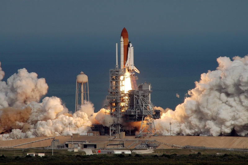 40. Backdropped By the Atlantic Ocean, Space Shuttle Atlantis (STS-122) Lifts Off From Launch Pad 39A, February 7, 2008, NASA Kennedy Space Center, State of Florida, USA. Photo Credit: Jim Grossmann; Kennedy Media Gallery (http://mediaarchive.ksc.nasa.gov) Photo Number: KSC-08PD-0202, John F. Kennedy Space Center (KSC, http://www.nasa.gov/centers/kennedy), National Aeronautics and Space Administration (NASA, http://www.nasa.gov), Government of the United States of America.