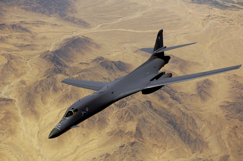 31. A U.S. Air Force B-1B Lancer Long-Range, Supersonic, Heavy Bomber Over the Mountains, May 27, 2008, Jomhuri-ye Eslami-ye Afghanestan - Islamic Republic of Afghanistan. Photo Credit: Master Sgt. Andy Dunaway, United States Air Force; Defense Visual Information (DVI, http://www.DefenseImagery.mil, 080527-F-BC606-071 or 080527-F-2828D-071) and United States Air Force (USAF, http://www.af.mil), United States Department of Defense (DoD, http://www.DefenseLink.mil or http://www.dod.gov), Government of the United States of America (USA).